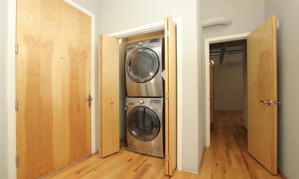 The door to the left opens to the exterior 6th floor of the building so are 2 entrances to this 2-story loft. An awesome benefit!