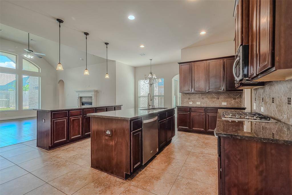 Stainless steel appliances and granite countertops