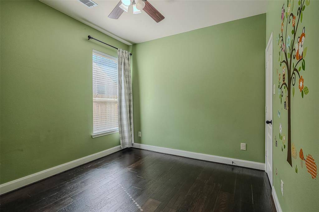Secondary bedroom with walk in closet
