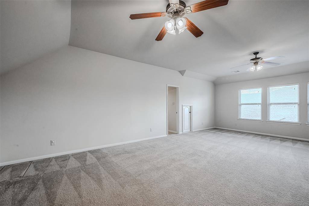 Large game room upstairs with insulation - ideal set up for media center or kids' games