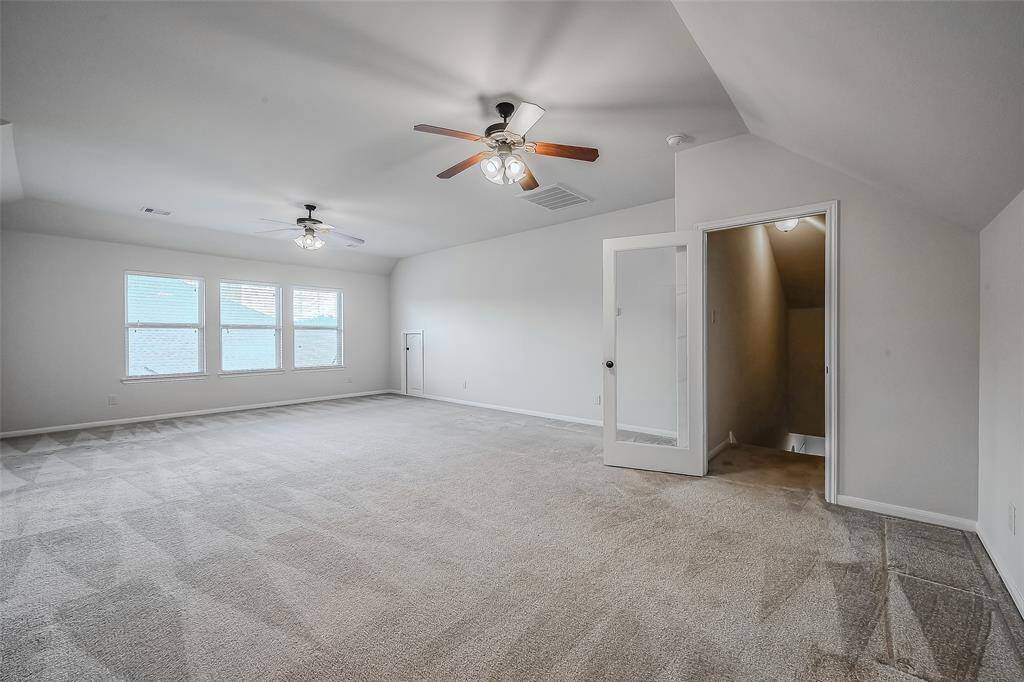 Large game room upstairs with insulation - ideal set up for media center or kids' games