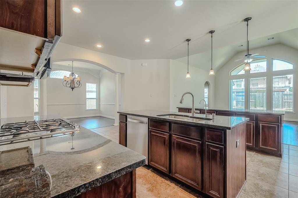 Plenty of cabinets and two islands - lots of space for cooking and entertaining