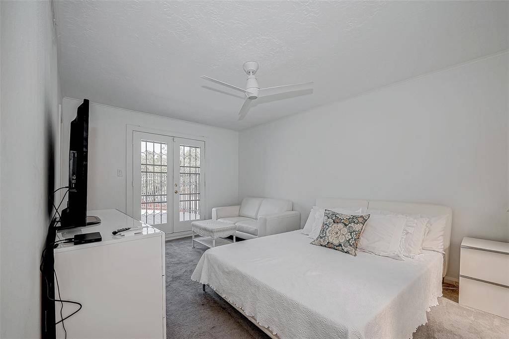 Upstairs secondary bedroomw with ensuite bathroom a