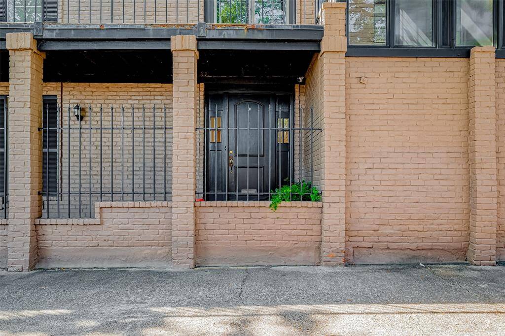 Front door is at the end of the covered front porch and faces east