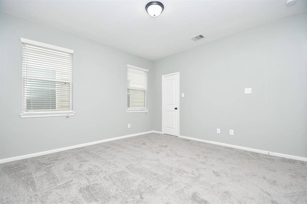 Another view of the secondary bedroom.