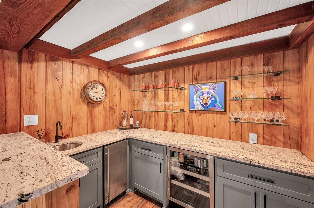 Full Wet bar includes separate ice maker & temperature controlled wine fridge
