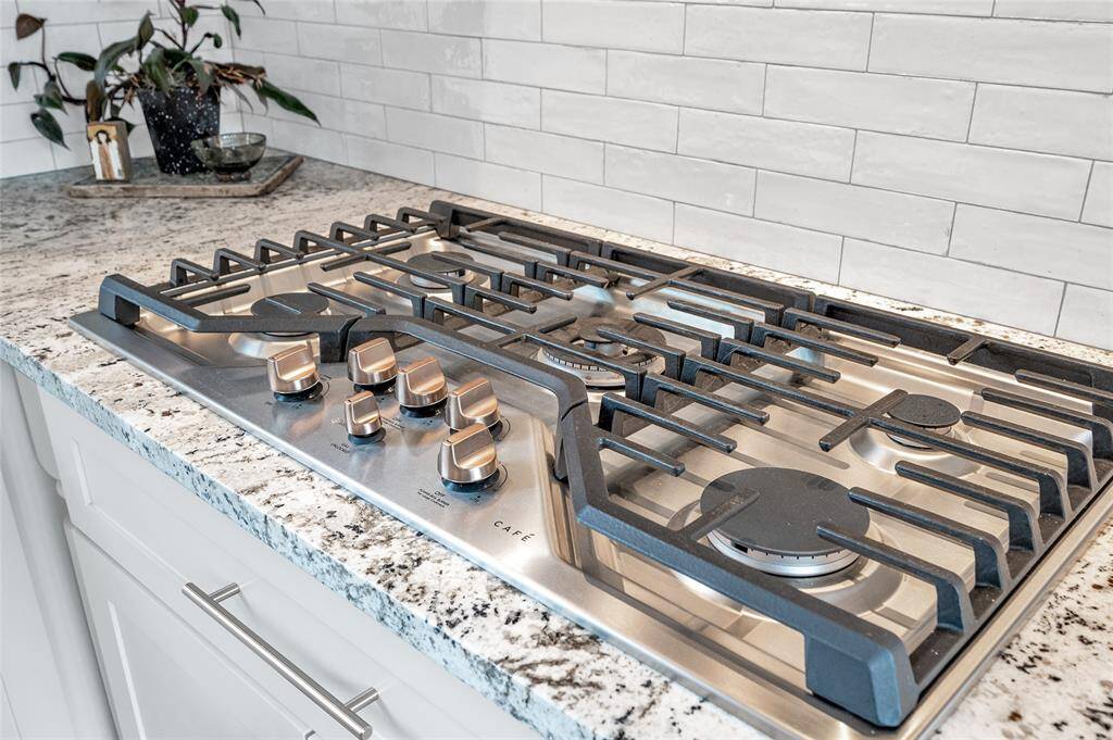 "Cafe"  5 burner gas cooktop with upgraded gold brushed handles