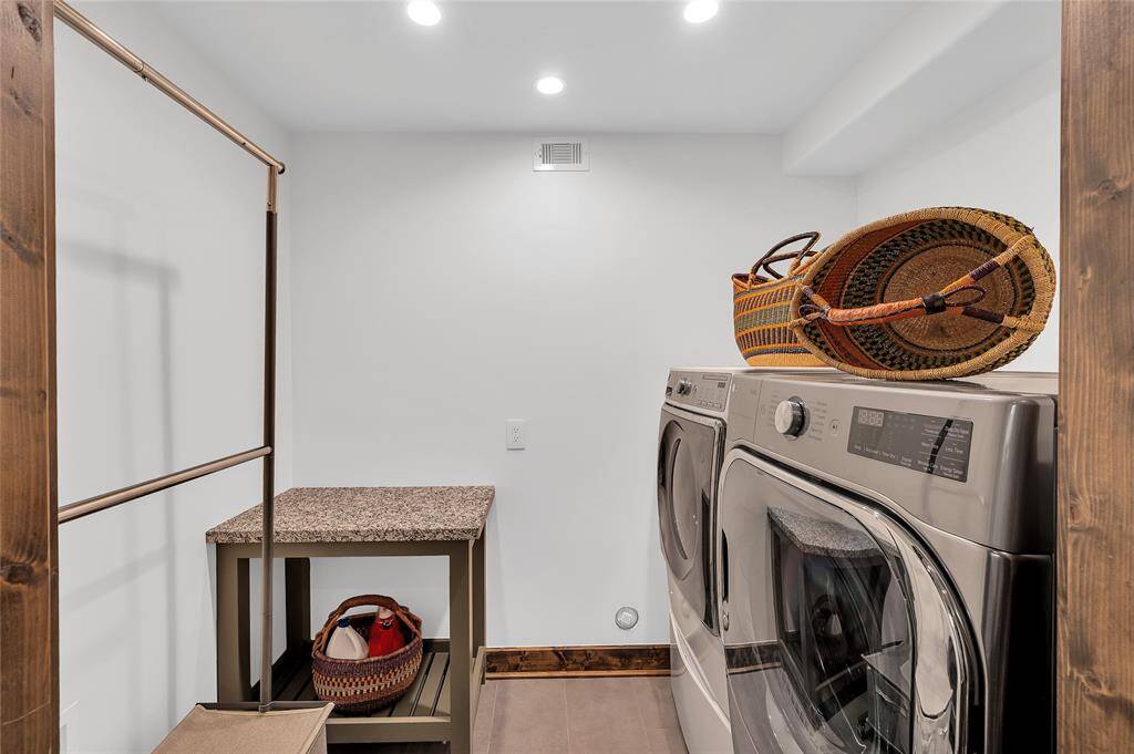 The laundry room is conveniently located off the kitchen