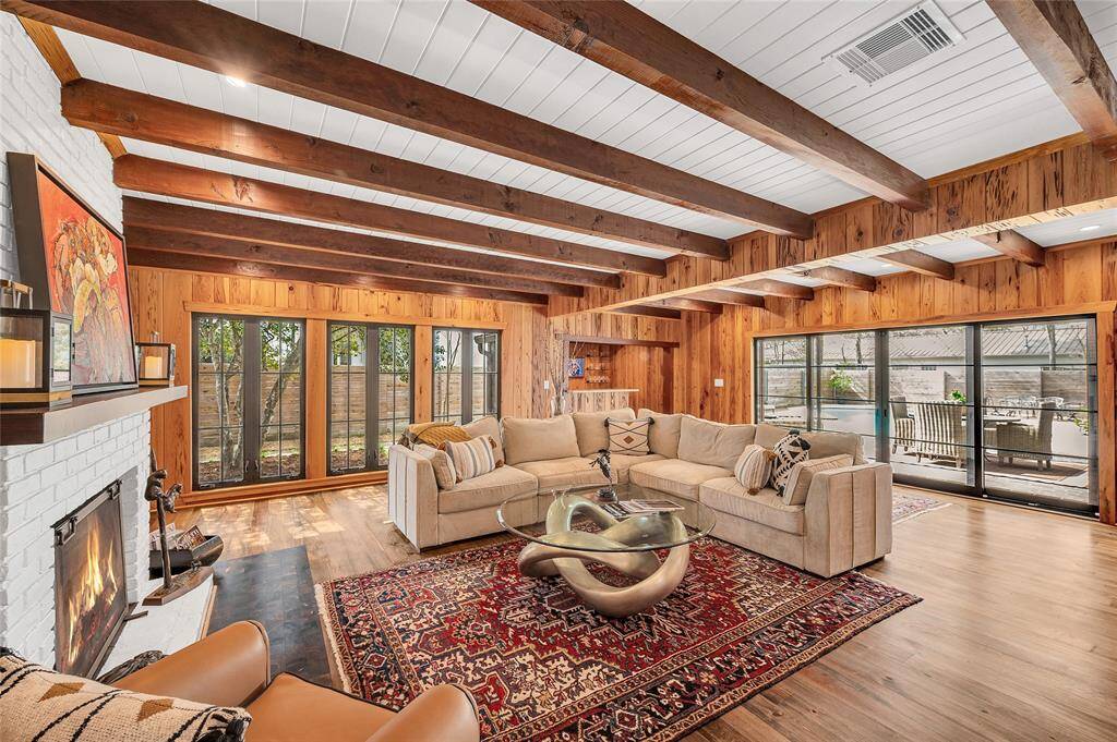 "Western Window Systems" metal & glass -  12ft floor to ceiling sliding doors open to the pool area