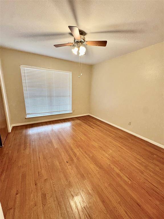 Bedroom 2 - Real Hardwood flooring