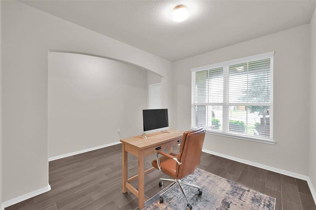 Make this space a sitting area, office or additional TV room/bedroom for guest