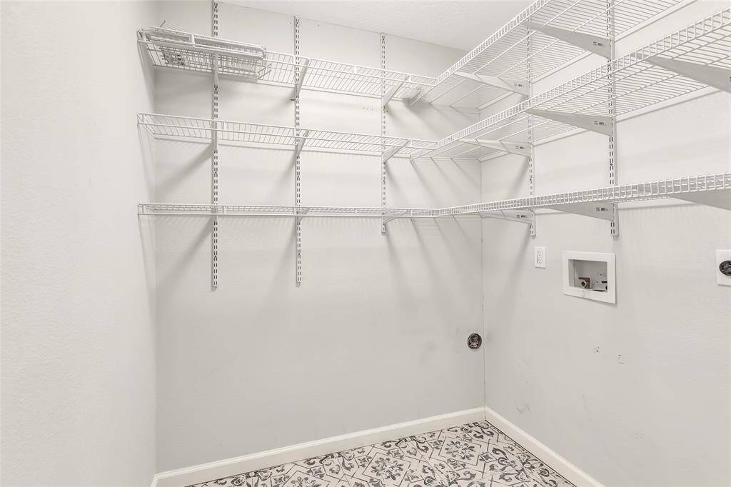 The laundry room is off the primary bedroom.
