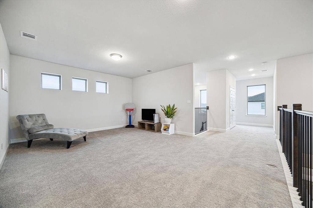 Another view of the awesome game room. It offers a versatile space for relaxation or entertainment.!