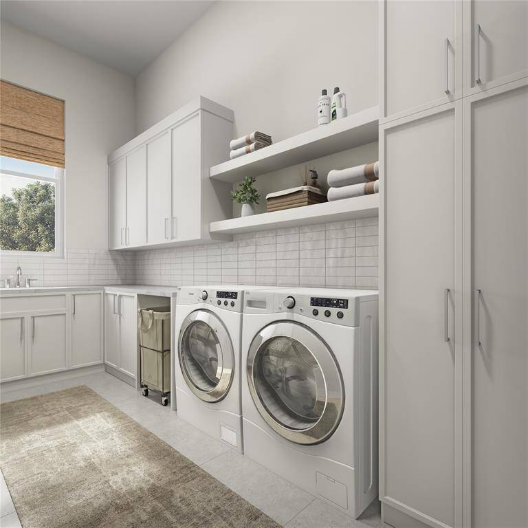 More than just a utility space, this well-sized laundry room offers convenience and efficiency. With room for both washer and dryer, plus storage or folding areas, it streamlines household chores while keeping everything organized and out of sight.