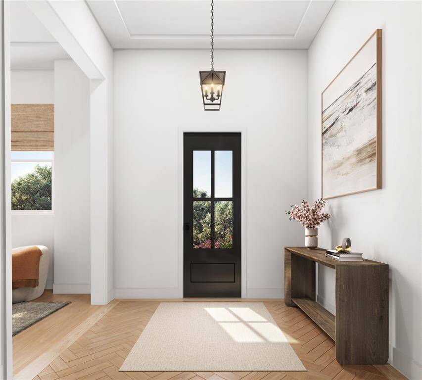 Welcome guests in style with this elegant foyer. Its generous proportions and design set the tone for the rest of the home, offering ample space for decorative elements like artwork or a statement table. A warm and inviting introduction to the Savannah's luxurious layout.