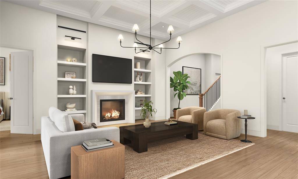 A grand living space designed for comfort and connection. With its generous dimensions, this room is perfect for cozy nights in or hosting guests. Ample seating and natural light create a warm and inviting ambiance that serves as the centerpiece of the home.