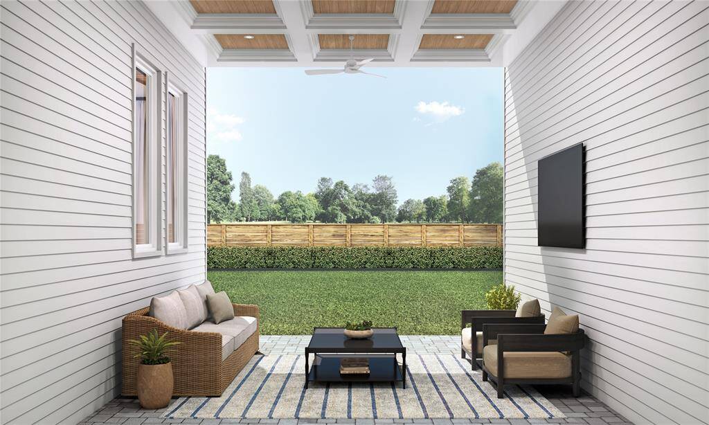 Enjoy the outdoors in style with this spacious covered patio. Perfect for relaxing with a morning coffee or hosting evening gatherings, it seamlessly extends your living space into the open air. Its generous dimensions accommodate lounge furniture or a dining set.