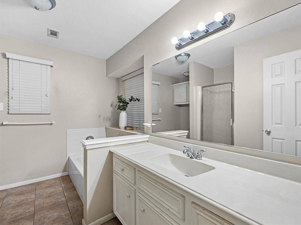 Primary bath with large soaking tub and seperate shower