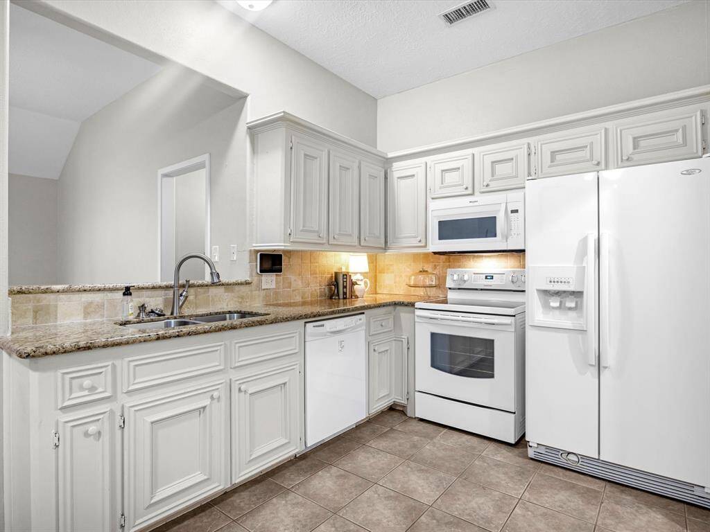 Kitchen with granite counters