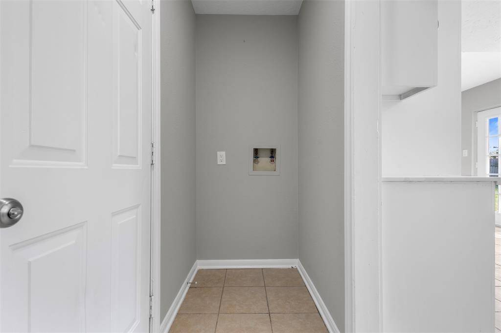 In home laundry room off the kitchen.