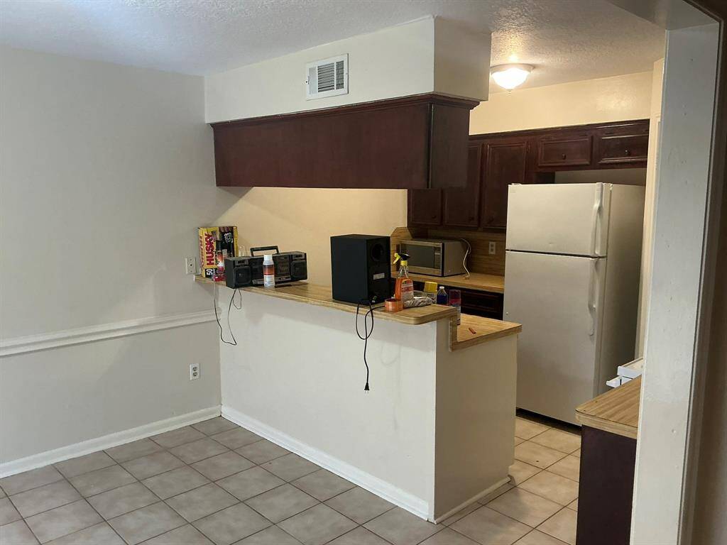 Unit B Kitchen and Dining