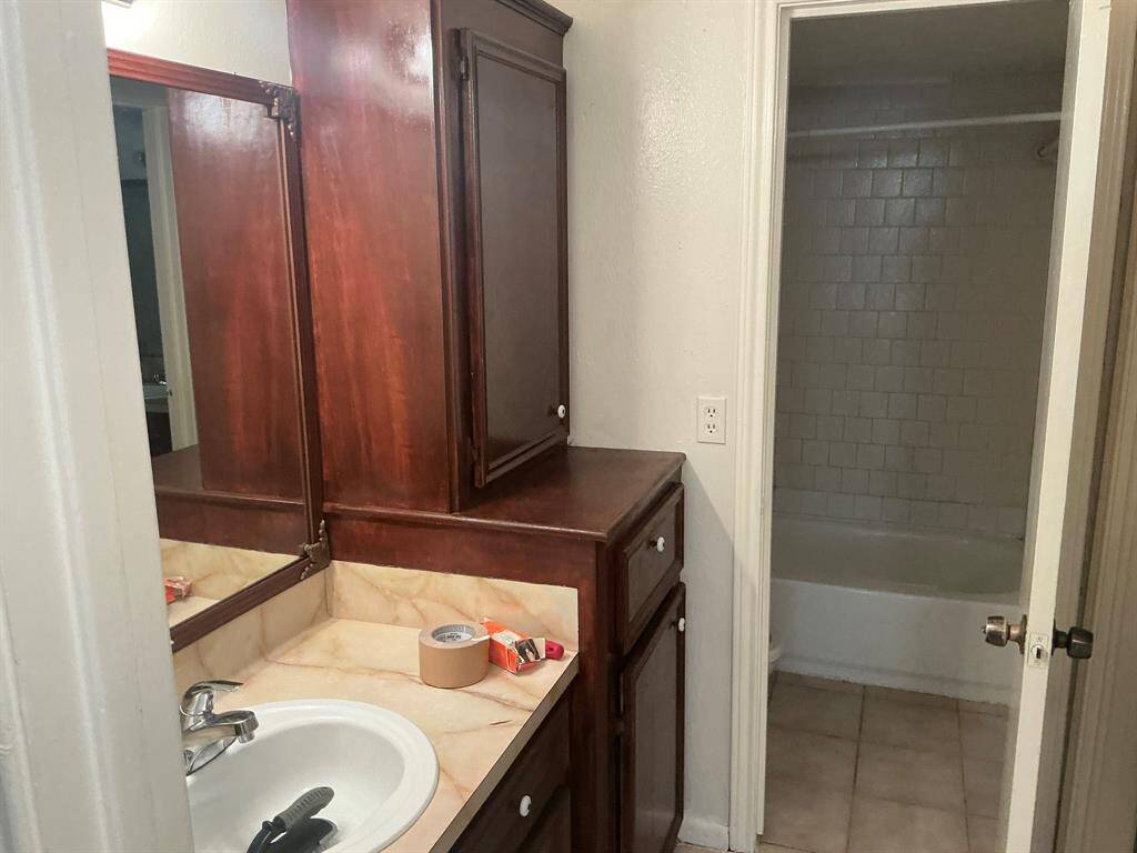 Unit B Bedroom 2 sink and cabinets
