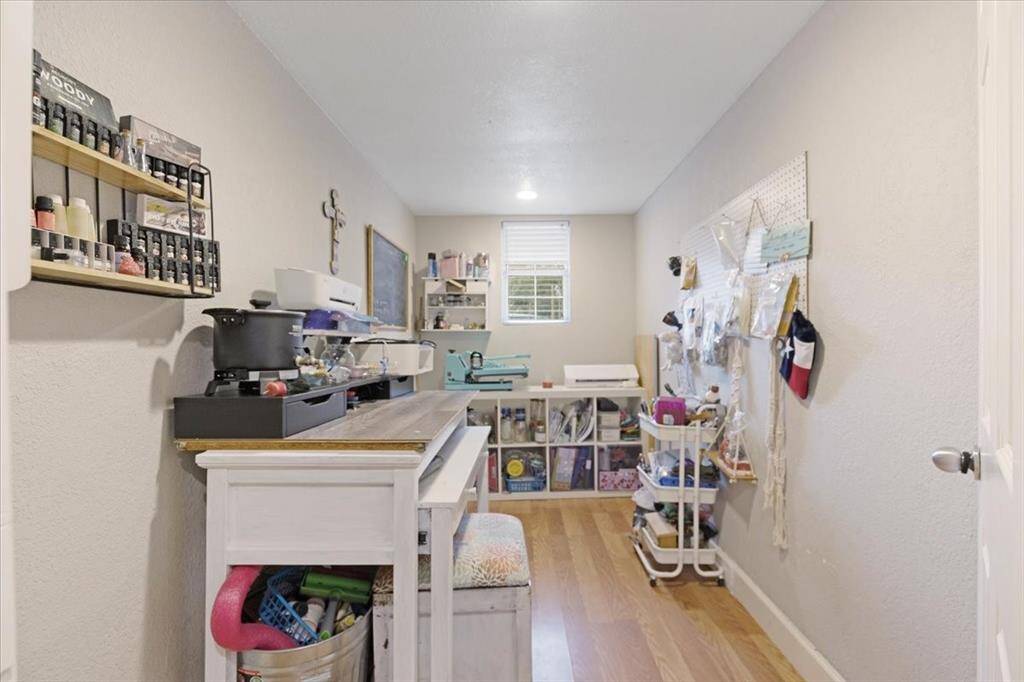 Secondary bedroom currently used as a craft room.