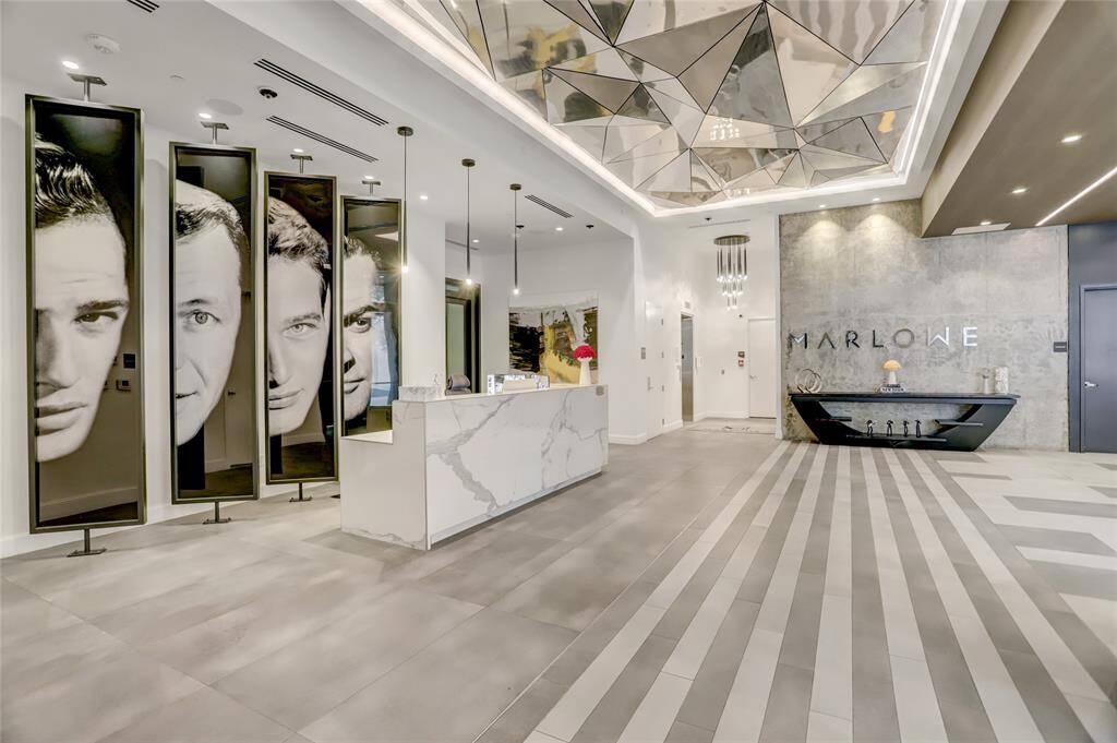 Step into the lobby, and you're immediately welcomed by a sleek, modern design that exudes sophistication. With soaring ceilings, stylish seating areas, and elegant finishes, the space is both inviting and impressive. The 24-hour concierge is always available to assist, ensuring convenience and security at any hour.