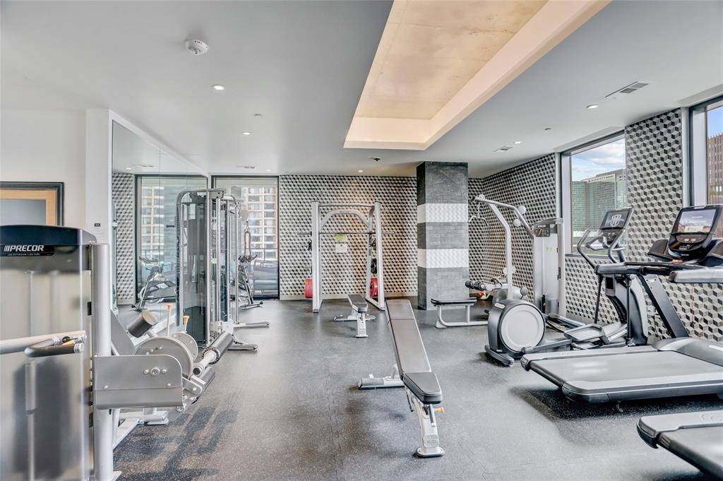 Located on the 8th floor, the fitness center offers everything you need for a complete workout with a view. Floor-to-ceiling windows flood the space with natural light, showcasing sweeping city views as you exercise. The gym is fully equipped with top-tier cardio machines, strength-training equipment, and free weights, catering to all fitness levels.