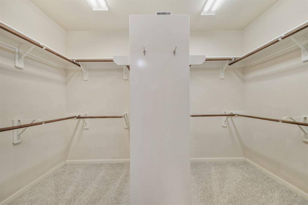 Large primary walk-in closet.