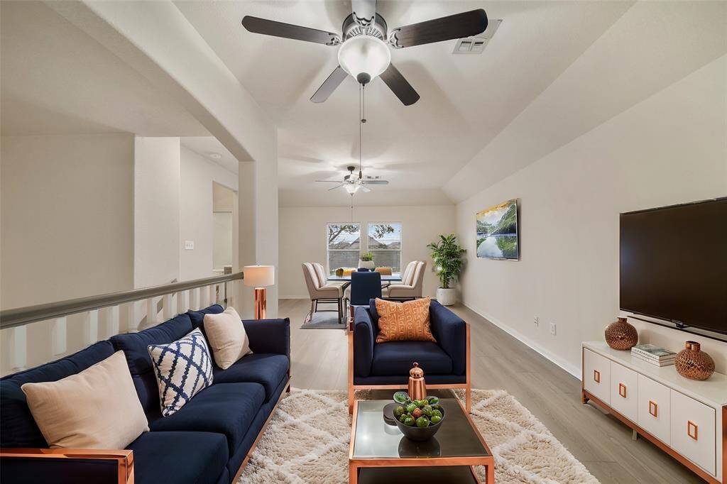 Upstairs game room, virtually staged.