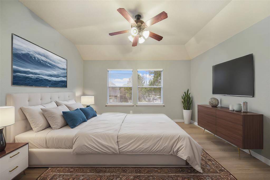 First bedroom upstairs, virtually staged.