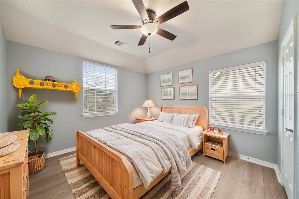 Second bedroom upstairs, virtually staged.