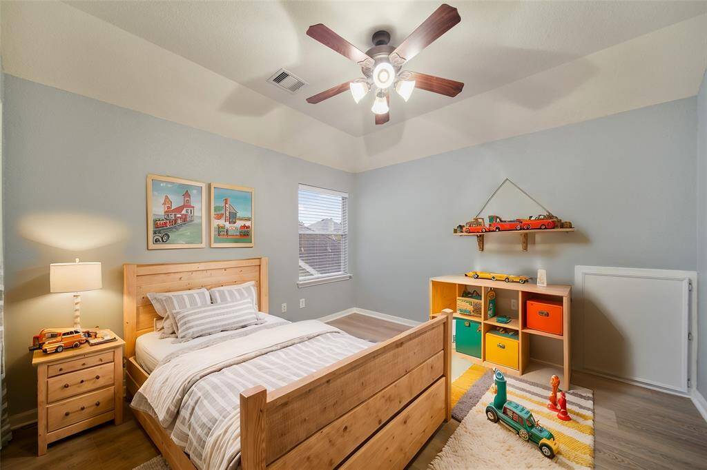 Third bedroom upstairs, virtually staged.