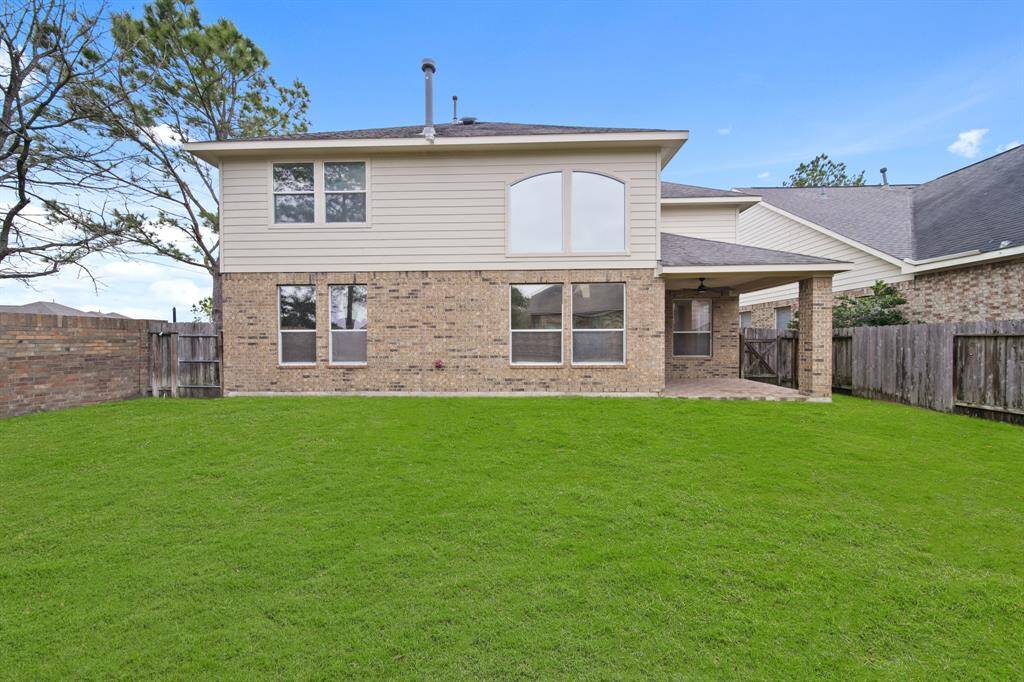 The backyard, perfect for entertaining or relaxing.