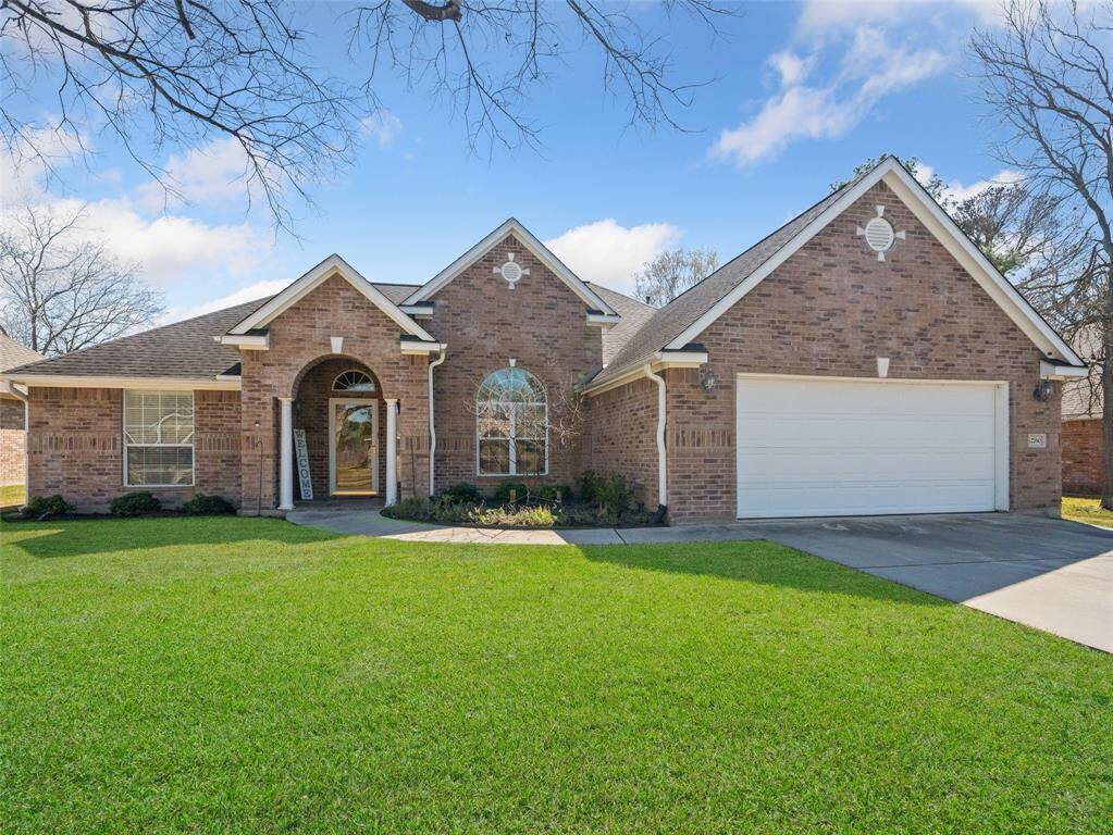 Welcome to Capricornus Drive in the gated community of Point Aquarius! This brick home has great curb appeal with a covered entry porch.