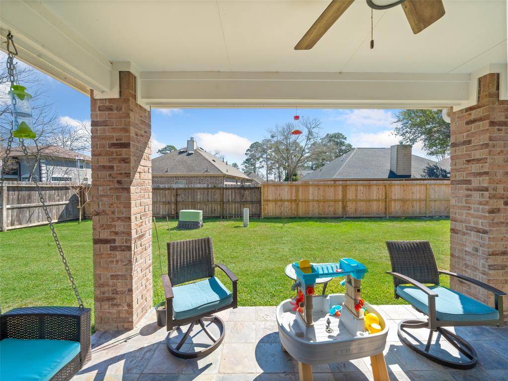 Covered back porch for enjoying the outdoors.