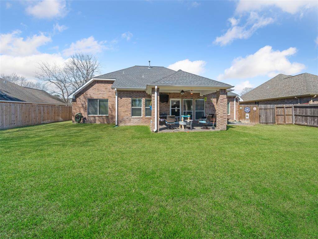 Back view of the home with porch.