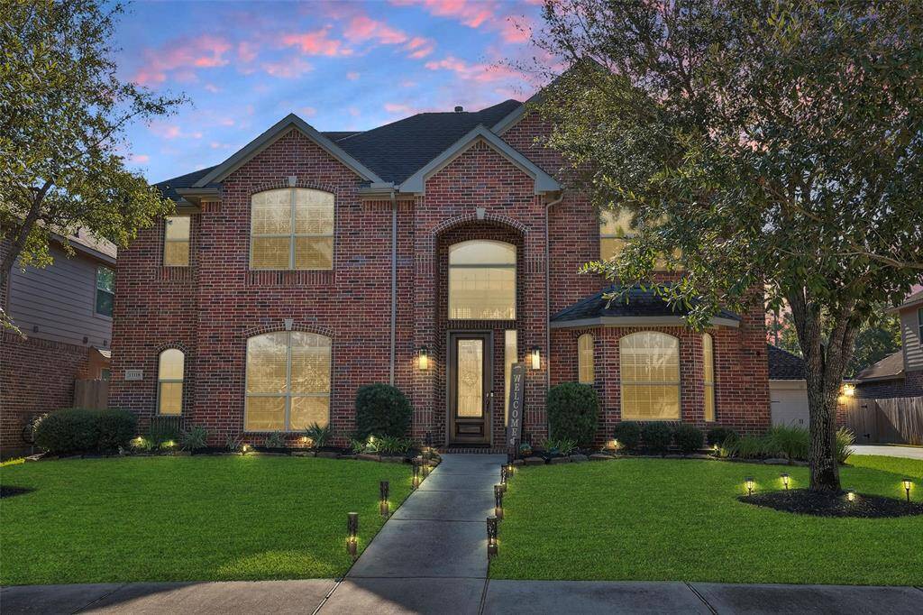 The beautiful brick home sits on a quiet cul-de-sac street and offers lovely curb-appeal you'll be proud to call home.