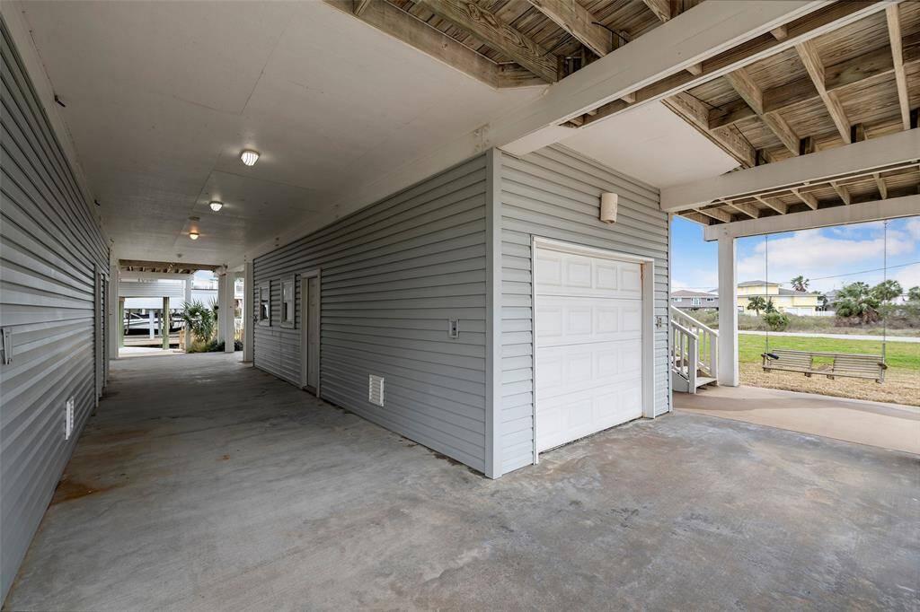 Breezeway under the garage makes for a cool retreat in the hot summer months.