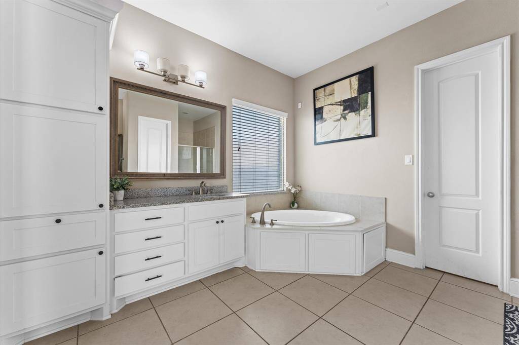 Full bathroom in downstairs secondary bedroom.