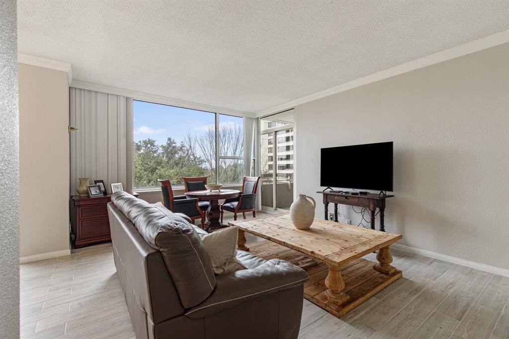 Living room with balcony access.