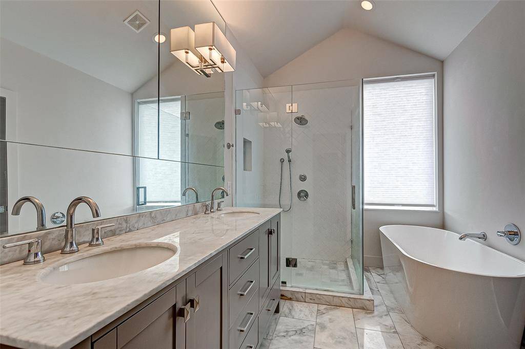 Primary bathroom separate shower and freestanding tub
