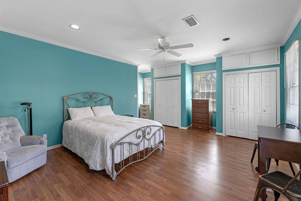 Apartment garage bedroom with a double closest and separate walk in closet. So much custom storage space for all your needs.