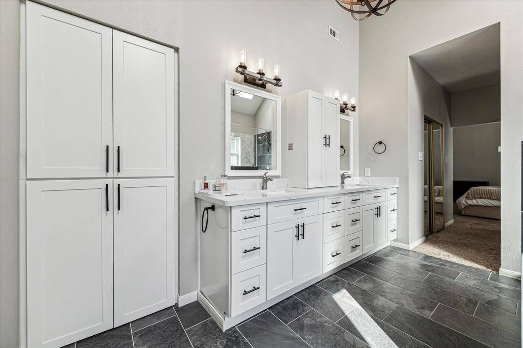 New master bathroom cabinets provide generous storage.