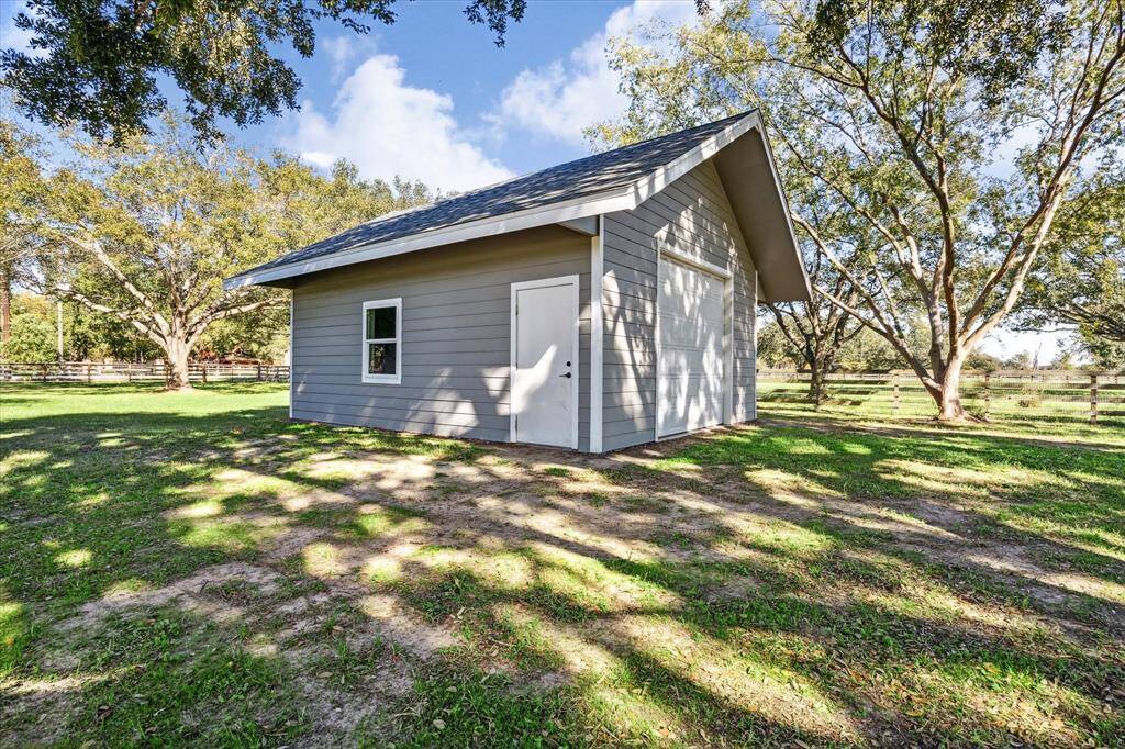 Enjoy the versatility of a recently added workshop/second garage, conveniently located next to the main home.