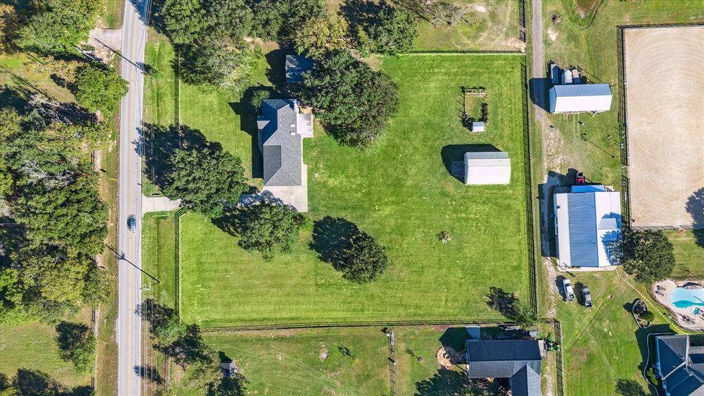 This stunning 2.2-acre property is fully fenced, offering privacy and security.