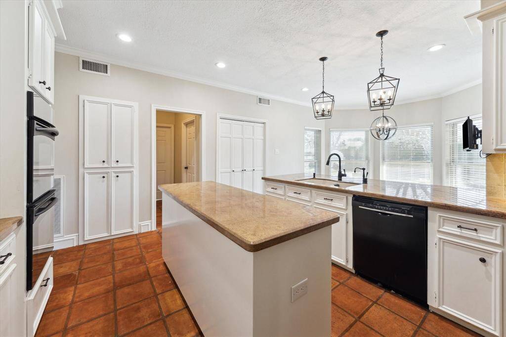 The kitchen has double ovens, microwave, cooktop, Refrigerator and TV so you can watch your favorite shows while cooking your specialty meals!