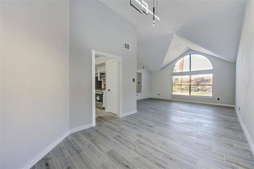Seamless transition from dining area to kitchen.