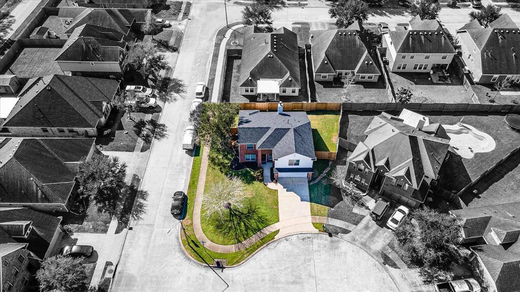 A closer look shows the classic dark gray, brand new roof installed January 2025!